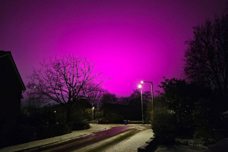 Mysterious pink skies amid England snowfall linked to soccer stadiums