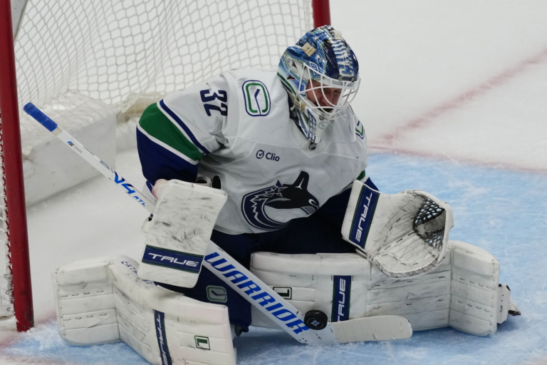 Boeser has hat trick, last-place Canucks overcome blowing 4-goal lead to beat NHL-leading Avs