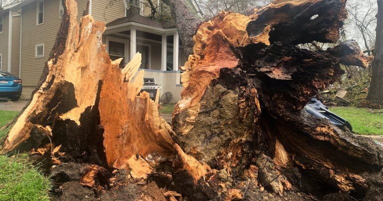Floodwaters inundate Wisconsin streets, trapping drivers, as Midwest rebuilds after storms