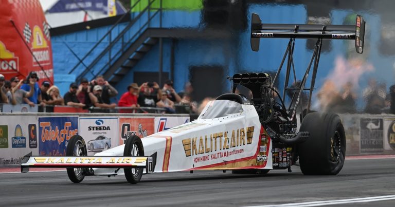 Shawn Langdon breaks the NHRA speed record by reaching 345 mph in his Top Fuel dragster