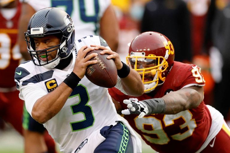 Former Seahawks QB Russell Wilson says goodbye to football